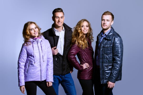 Two,Young,Couples,In,Winter,Clothes,In,A,Studio.fashion,Shot.